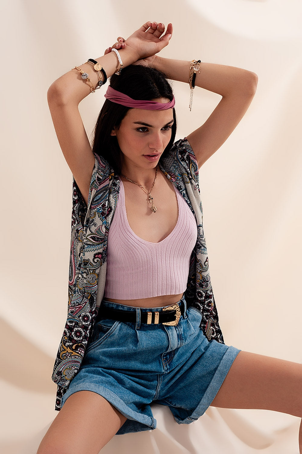 High-waisted blue denim shorts, 100% cotton, relaxed fit, above-knee length, perfect for summer.