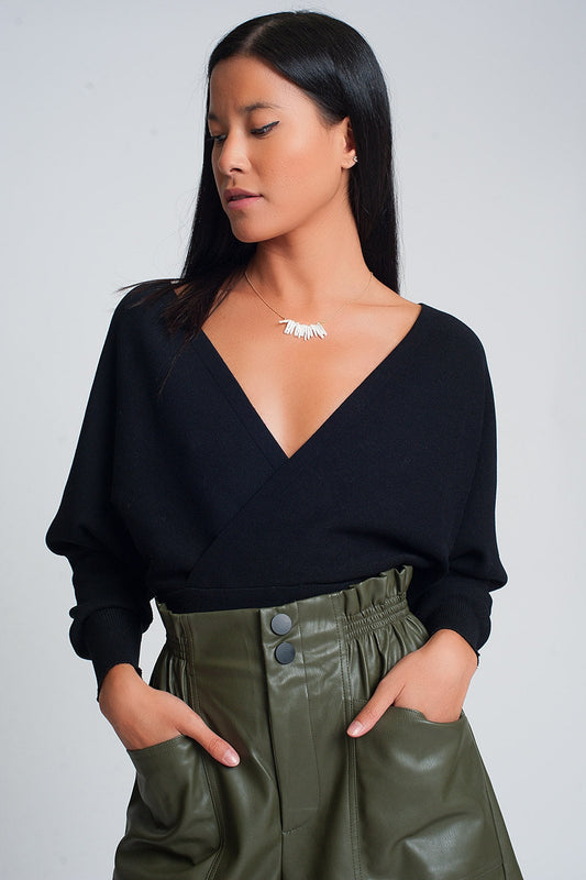 Pull élégant noir à nouer dans le dos, à manches longues, col en V en viscose.